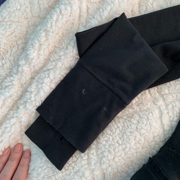 LULULEMON BLACK WOMANS MEDIUM RUFFLED WAIST ZIP UP. Gently loved - Picture 2 of 6